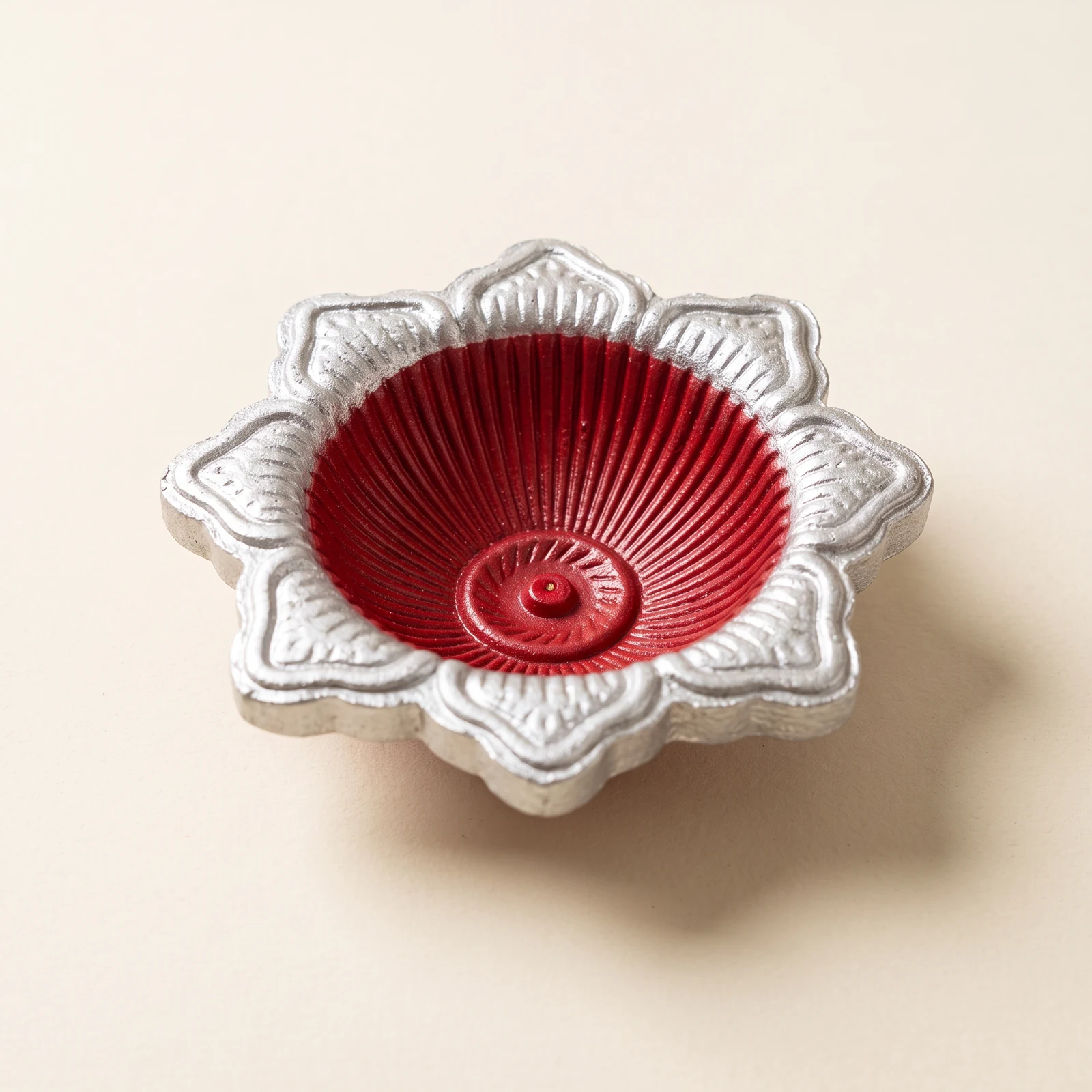 Silver Star Red Diya — handmade details on an ivory background